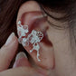 Detail view of the sculpted orchid ear cuff
