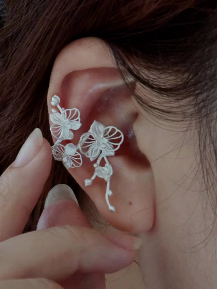 Detail view of the sculpted orchid ear cuff