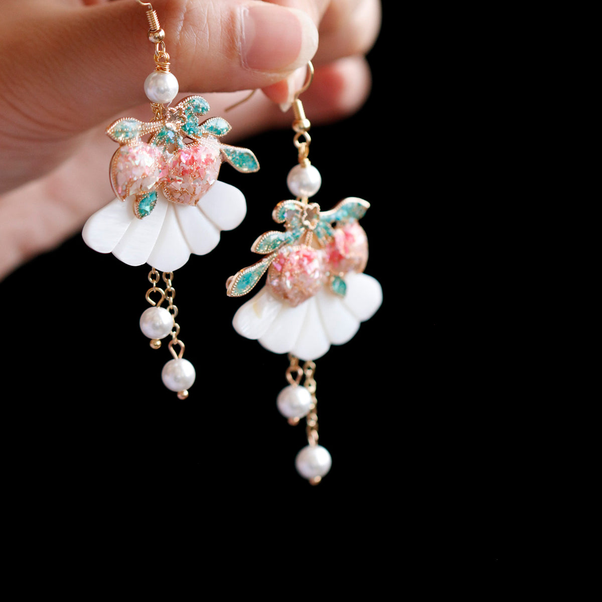 Peach-inspired dangling earrings, product view