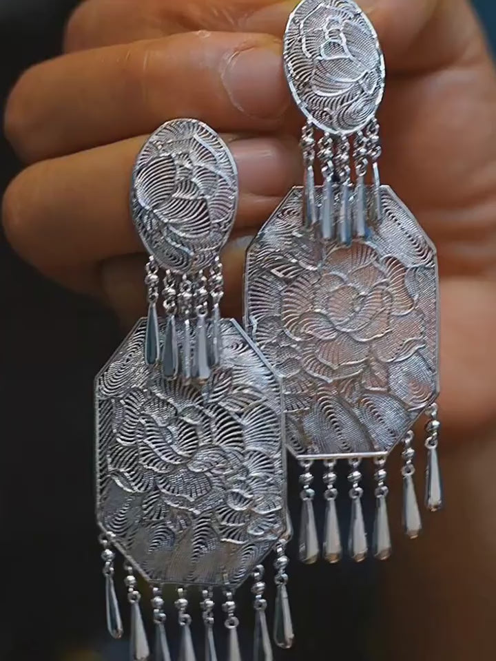 Product video showing the peony filigree tassel drop earrings