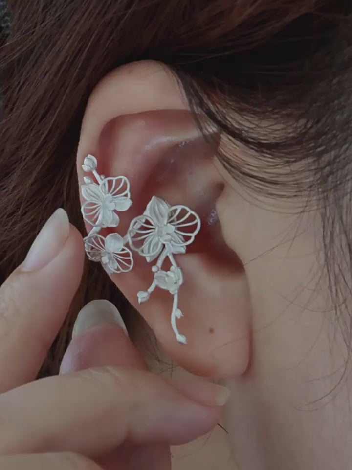 Video showing the Phalaenopsis orchid copper ear cuff
