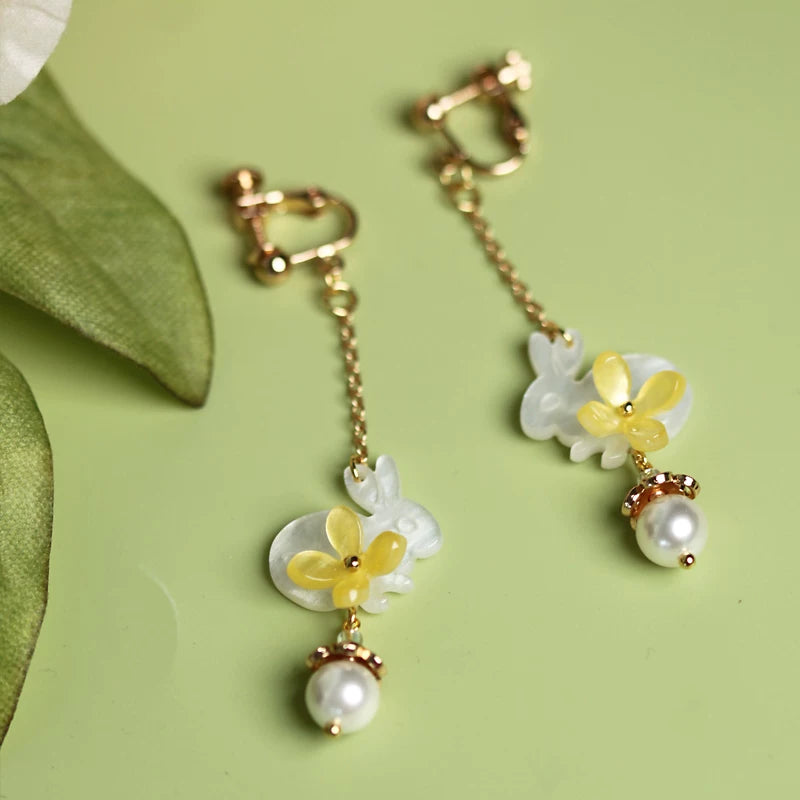 Close product view of the rabbit floral drop earrings