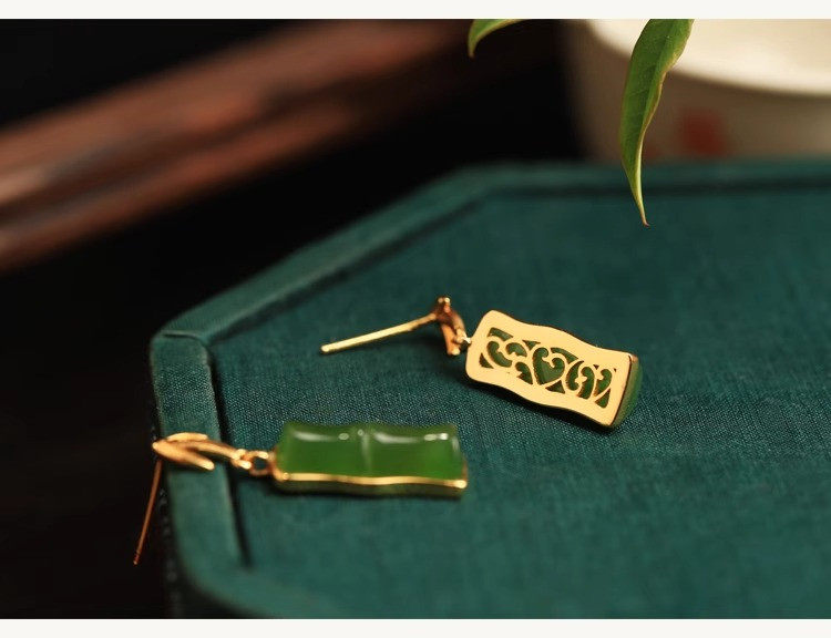 Reverse side of a green bamboo segment stud earring with openwork backing