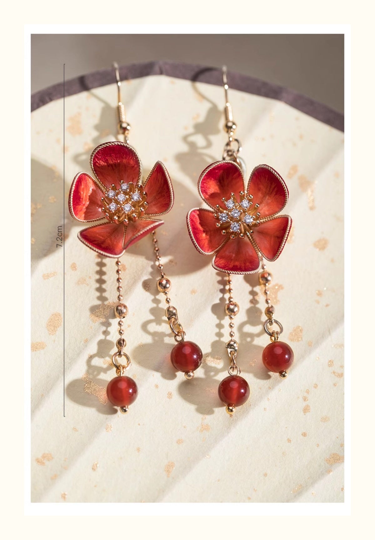 Approximate overall length of the pierced drop earrings: 7.2 cm per earring