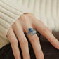 Koi and begonia ring displayed with its adjustable open band