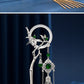Silver bamboo orchid hairpin top detail with green beads
