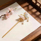 Song brocade butterfly hairpin with a gold-tone pin and pearl-style drops