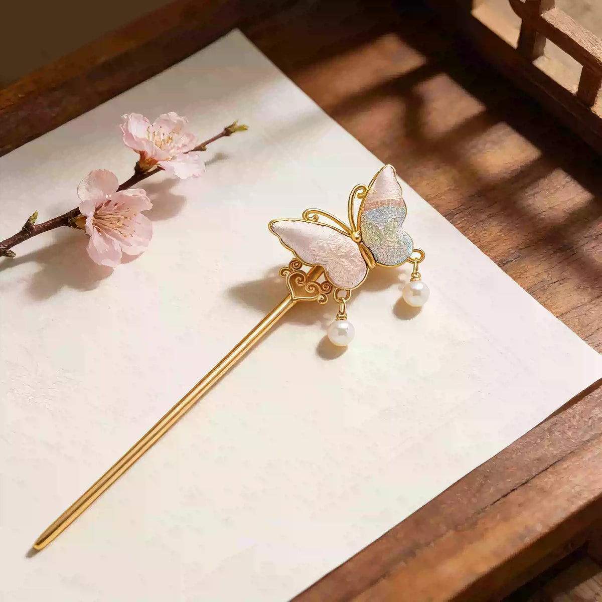 Song brocade butterfly hairpin with a gold-tone pin and pearl-style drops